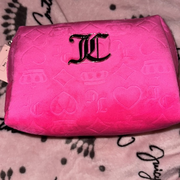 Juicy Couture Handbags - Juicy Couture logo embossed makeup/toiletry travel bag